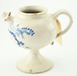 Lot #411 - Early 18th century Faience Pharmacie Chevrette with earthenware handled body adorned