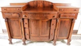 Lot #464 - Gorgeous Empire Mahogany and flame grain sideboard with drop center gallery over two