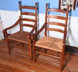 Lot #493 - Pair of contemporary Cherry ladder back rush bottom open arm chairs 44”high