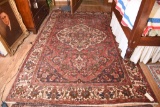 Lot #517 - Iranian Serapi style wool Pile area rug  (82” x 124”)