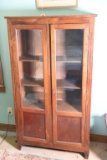 Lot #522 - Late 19th Century Walnut two door linen press with three shelves behind two glass