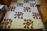 Lot #540 - Red and green floral tulip design applique quilt (some staining but otherwise good