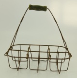 Lot #681 - Six Milk Bottle Wire carrying rack with Wood handle