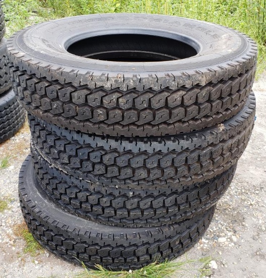 4 New Triangle 11R 24.5 Radial Unmounted Truck tires. Marked 149/146M120 PSI. Standard 8.25" Rim.