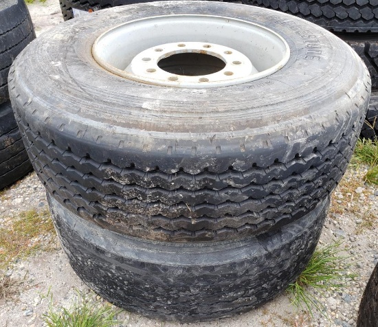 2 Used Bridgestone 385/65R 22.5 M854 Radial Truck Tires mounted on Steel 10 Lug Rims that fit a