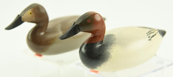 Lot #344 - Pair of miniature carved Canvasbacks drake and hen (from the Mort Kramer Collection)