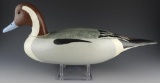 Lot #793 - L.A. Holloway Jr. Pintail Drake decorative decoy in working style. Leather loop for