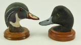 Lot #369 - (2) Carved and painted duck heads by Carl Bicker Bluebill and Wood Duck (from the