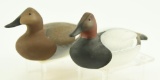 Lot #370 - Pair of Capt Bill Collins hand carved miniature Canvasbacks drake and hen signed on