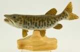 Lot #540 - Hand carved Musky by R.S. McKenzie on driftwood 8” signed and dated on underside