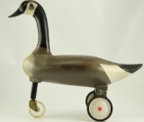 Lot #638 - R. Madison Mitchell 1970 full size Canada Goose decoy converted to childs ride on