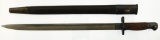 Lot #103 - Wilkinson Pattern 1907 British pattern bayonet with Scabbard. 17