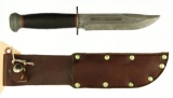 Lot #281 - Original U.S. WWII Named RH Pal 36 Fighting knife with Leather Scabbard