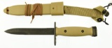 Lot #282 - U.S. military M7 bayonet in an M10 marked tan composite sheath. 6.5