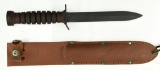 Lot #352 - M3 Camillus Fighting Knife & Scabbard. U. S. Bomb Stamp on Pommel. Blade is Marked.