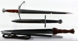  Lot #713 - (3) Daggers: steel 21” stainless steel with carved wooden handle and leather sheath