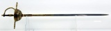  Lot #730 - Spanish Brass decorated and enameled fencing sword with cup style hand guard 34”