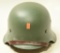 Lot #1146 - WWII German Military w/liner. Has Nazi decals on each side.