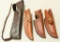 Lot #1297 - (4) Leather knife sheaths including one by Puma, one by buck, & two with tooled  bo