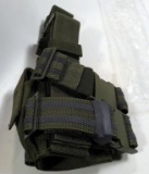 Lot #1111 - Lot of tactical holsters to include O.D. Tactical Lag holster, Fox Tactical  should