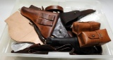 Lot #1130 - Large lot of gun related holsters , pouches, straps, and much more. Includes 2  lea