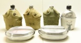 Lot #1135 - Lot of US military canteens and mess kits. Includes 4 canteens and two mess kits.