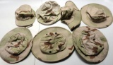 Lot #1253 - Large lot of desert camo clothing and accessories to include (5) Boonie hats,  helm