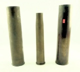 Lot #1475 - (3) Large artillery casings. One is marked 40MM MK2 11-1944 R.V. Lot 1108,  75MM M1