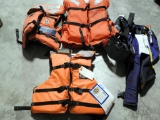 Lot #1560 - Lot of (3) life jackets including Inflatable type V Convertible PFD.
