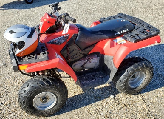 Lot #1775d - Polaris Sportsman’s 90 four wheeler front and rear racks. We replaced the battery.