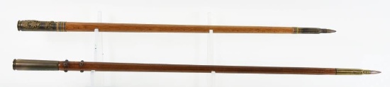 Lot #1900b - (2) Swagger Sticks: 22” and 24” both made from .50 cal rounds, one with US  Spread