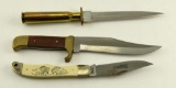 Lot # 4584 - (3) knives: 50 cal bullet handle , brass and wooden handle, Schrade Scrimshaw folder