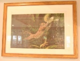 Lot # 4151 - Print on canvas of jaguar in tree by Bob Kuhn. Has been professionally framed and