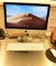 Lot #1256 - Apple Imac model EMC 2544 21.5” screen with Intel Core i5 in silver finish with mouse