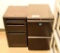 Lot #1290 - (2) Undercounter/under desk cabinets in black matte finish one is three drawer