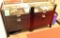 Lot #1324 - Pair of contemporary two drawer office end table/cabinets with glass tops