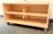 Lot #1377 - Commercial storage compartment/shelf on castors in natural Maple finish