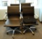 Lot #1383 - (4) Black vinyl and chrome office chairs (3) have wear to vinyl (1) is in good to