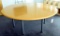 Lot #1432 - Designer style (30” x 78”) round conference table with mustard top and gray gun metal