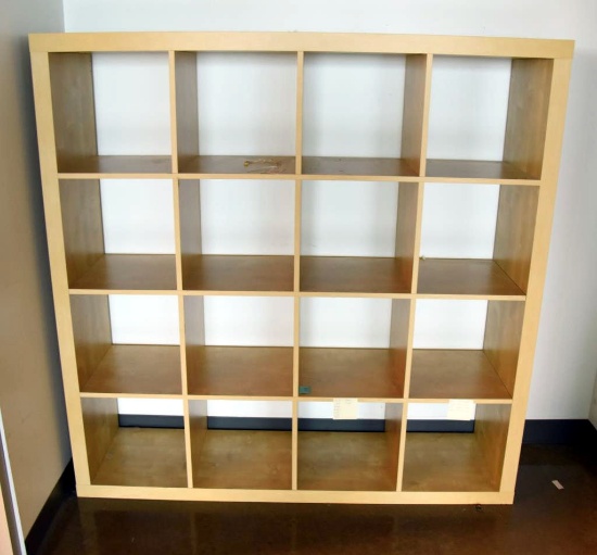 Lot #1455 - Contemporary natural finish 16 compartment storage case/bookcase (59” x 59” x 17”)