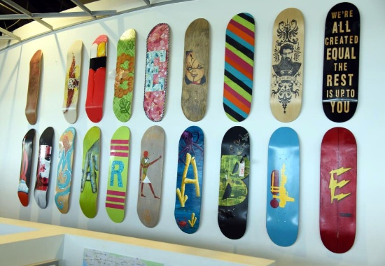 Lot #1463 - (19) painted skate board decks in various designs and motifs (skate decks are screwed