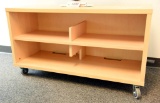 Lot #1377 - Commercial storage compartment/shelf on castors in natural Maple finish