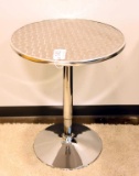 Lot #1412 - Brushed aluminum finish and chrome contemporary pedestaled side table (29” x 24”)