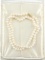 Lot #2: Ladies strand of uniform cultured pearls 24