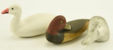 Lot #199 - Ed Sitko miniature carved Redhead drake with preening head signed and dated 1993,