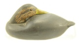Lot #284 - Miniature carved Black Duck with preening head unsigned in original paint 3 ½” A51.129