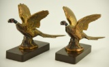 Lot #61 - Pair of 7” figural brass and enameled flying Pheasant bookends