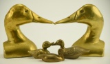 Lot #73 - Pair of figural brass 6” duck head book ends and (3) brass duck desk paperweights