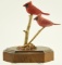 Lot #445 - Pair of Male Cardinals on twig habitat base by Harry S. Joyner branded by carver on