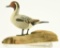 Lot #461 - W. Reinbold miniature carved full body standing Pintail drake on driftwood signed on